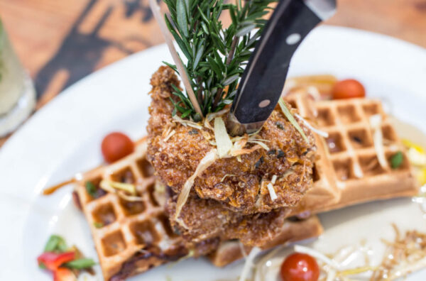 Andy’s Sage Fried Chicken & Waffles at Hash House A Go Go Henderson—one of the signature dishes that supports local farms and delivers bold, twisted farm flavor.